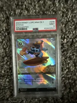 2023 DISNEY LORCANA THE FIRST CHAPTER #206/204 STITCH ENCHANTED PSA 9 - Image 1