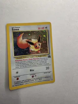 Pokemon Eevee #11 Black Star Promo card from 1999 featuring a holographic finish - Image 1