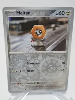 MELTAN 102/142 - POKEMON - REVERSE HOLO - STELLAR CROWN - Image 1