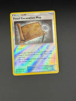 Pokemon Fossil Excavation Map Reverse Holo SM - Forbidden Light 107/131 NM - Image 1