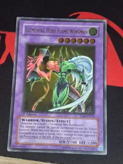 Elemental Hero Flame Wingman TLM-EN035 1st Edition Ultimate Rare Yu-Gi-Oh! card - Image 1