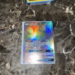 Pokemon TCG Unbroken Bonds Dedenne GX 219/214 Secret Rare Rainbow Card - Image 1