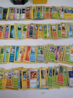 Large Pokemon Card Bundle with Tin and Pikachu Deck Box - Image 2