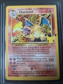 Charizard 4/102 Celebrations: Classic Collection Holo DMG Card Has Creasing - Image 1