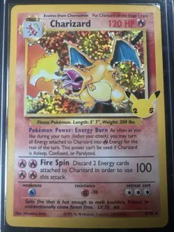 Charizard 4/102 Celebrations: Classic Collection Holo DMG Card Has Creasing - Image 2