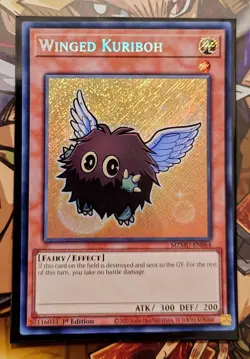 Winged Kuriboh (Secret Rare) - MZMU-EN064 - Maze Of Muertos - Yu-Gi-Oh TCG - Image 1