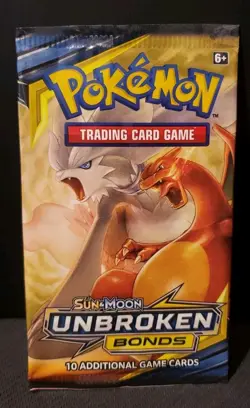 *EMPTY* POKEMON SUN & MOON UNBROKEN BONDS BOOSTER PACK RESHIRAM/CHARIZARD ART - Image 1