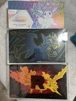 Pokemon UPC Sealed Lot - Prismatic, Moltres, Charizard UPC - Image 1