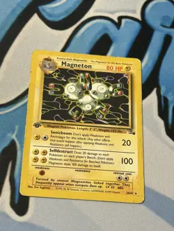 1st Edition Magneton 26/62 Non-Holo Fossil Pokemon Card DMG - Image 1
