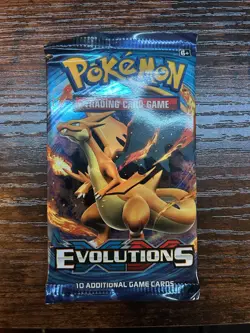 Pokemon XY Evolutions Loose Booster pack, Mega Charizard Y art - Image 1