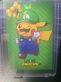 Pokemon 2024 Card Database Christmas Set Luigi Pikachu Green Cracked Ice - Image 1
