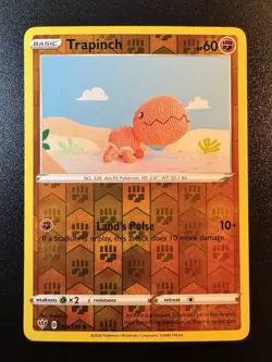 Trapinch - 089/189 - Asako Ito Crochet Art - Reverse Holo Pokemon Card - LP - Image 1