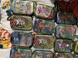 Pokemon TCG: Scarlet & Violet Prismatic Evolutions 151 and paldea friends tins - Image 2
