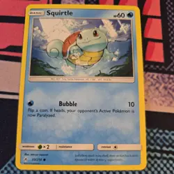 Squirtle 33/214 Unbroken Bonds Regular Pokemon card - Image 1
