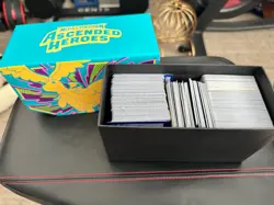 pokemon card lot with mini binders, tins, and ETB boxes - Image 1