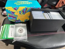 pokemon card lot with mini binders, tins, and ETB boxes - Image 5