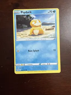 Pokemon-Evolving Skies- Psyduck 24/185 Error Misprint/Miscut alignment dot NM - Image 1