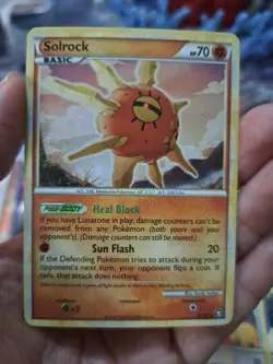 Solrock 9/102 - HGSS Triumphant - Holo Rare Pokemon Card - P4CK FRESH - Image 1