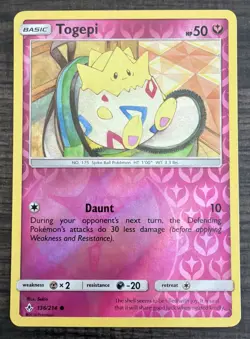 Pokemon TCG Unbroken Bonds Togepi 136/214 Common Reverse Holo Beautiful Card - Image 1