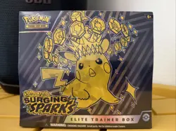 Pokemon TCG Surging Sparks ETB Factory Sealed a little rip on the side - Image 1