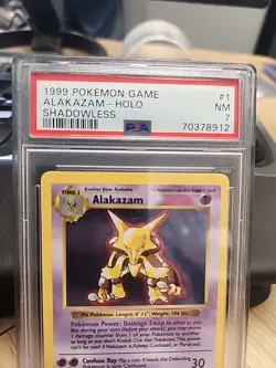 1999 POKEMON GAME SHADOWLESS #1 ALAKAZAM-HOLO PSA 7 - Image 2