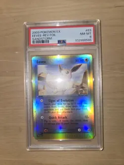 2003 POKEMON EX SANDSTORM #63 EEVEE-REVERSE FOIL PSA 8 - Image 1