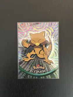 Abra Pokemon 1999 Topps #63 Black Logo TV Animation Edition Holo Foil - Image 1