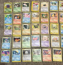 Reserved Pokemon card lot, 5 holo + 50 non holo - Image 1