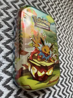 Pokemon Scarlet & Violet Prismatic Evolutions Mini Tin Jolteon New Sealed💥 - Image 2