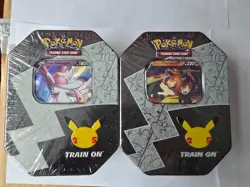 2 Pokemon Celebrations tins, Dark Sylveon & Lance's Charizard still sealed - Image 1