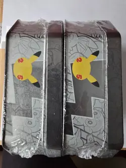 2 Pokemon Celebrations tins, Dark Sylveon & Lance's Charizard still sealed - Image 5