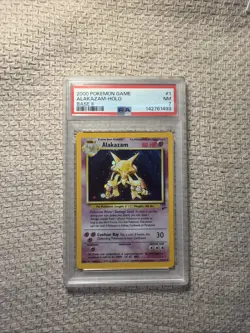 Pokemon Alakazam 001/130 Base Set 2 Holo PSA 7 - Image 1