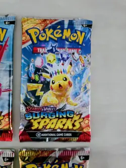 Pokemon Scarlet & Violet Surging Sparks Booster Pack X 4 Factory Sealed New - Image 2