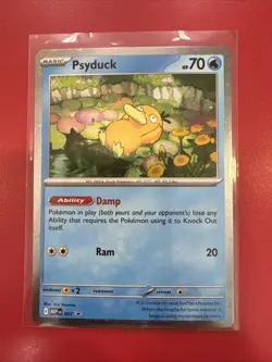 Pokemon TCG: Psyduck 007 MEP: Mega Evolution Black Star Promo Cosmos Holo - Image 1