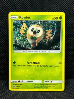 Pokemon Tcg Rowlet(Holo Bleed) SM01 Sun & Moon Black Star Promo - Image 1