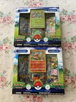 Pokemon Go TCG Bulbasaur And Charmander And Pins Boxes Set Of 2 - Image 1