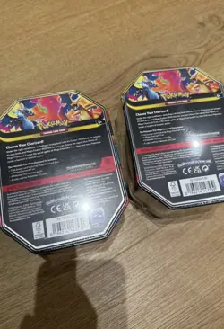 Pokemon TCG Mega Charizard X Tins. BOTH TINS. Brand New & Sealed in hand - Image 2