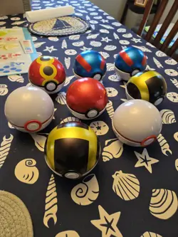 Pokemon TCG Poke Ball Tins, Lot of 14 Various Styles Empty, No Cards (E25, G25) - Image 1