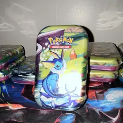 Pokemon Prismatic Evolutions Vaporeon Mini Tin 2025 Sealed - Image 1