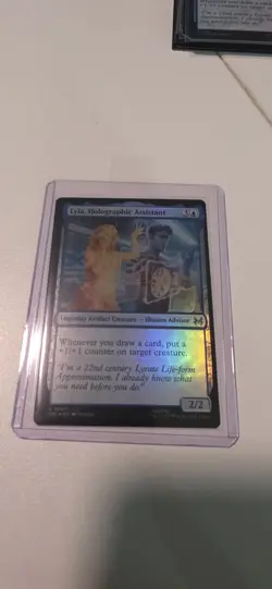 MTG Marvel's Spider-Man: Eternal-Legal Lyla, Holographic Assistant #0007 Foil - Image 1