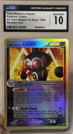 Team Magma’s Claydol Pokemon 2004 EX Team Magma Vs Aqua - 8/95 Rev Holo CGC 10 - Image 1