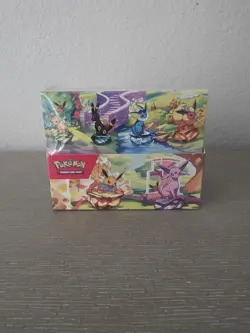 Pokemon Prismatic Evolutions Mini Tin Display Box (8 Mini Tins) - Factory Sealed - Image 1