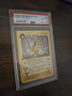 2000 POKEMON ROCKET 1ST EDITION #38 DARK JOLTEON PSA 8 - Image 1
