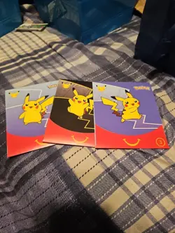 Pokemon 25th Anniversary McDonalds 2021 Promo Sealed Pack In Hand - Image 1