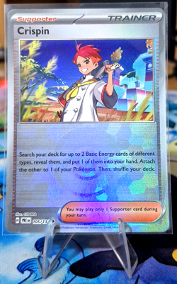 Crispin - 105/131 - Pokeball Holo - Prismatic Evolutions - Pokemon Card - NM/M - Image 1