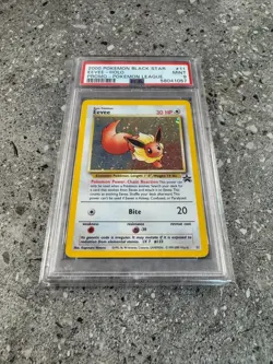 Pokemon TCG Cards Eevee 11 WOTC Black Star Promo Holo PSA 9 MINT - Image 1