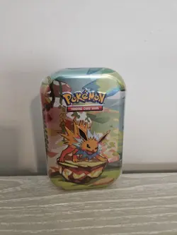Pokemon Scarlet & Violet Prismatic Evolutions Mini Tin Jolteon New Sealed! - Image 1