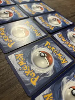 Pokemon NM Cosmos Holo 10 Card Lot + BONUS Pokemon Day 2026 Coin! - Image 5
