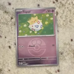 Pokemon Togepi 070/191 Sv08: Surging Sparks 50 HP Common Reverse Holo Card - Image 1