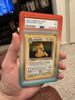 Pokemon Dragonite Holo PSA 7 Fossil 1999 #4 4/62 - Image 2